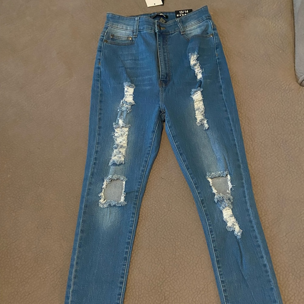 light blue ripped skinny jeans